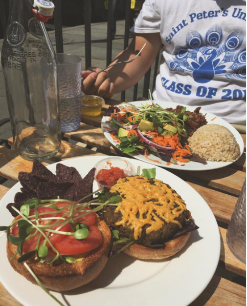 Sweet potato + kale veggie burger with vegan cheese. Photo by @Cugatron, https://www.instagram.com/p/BFpaBPgKncf/